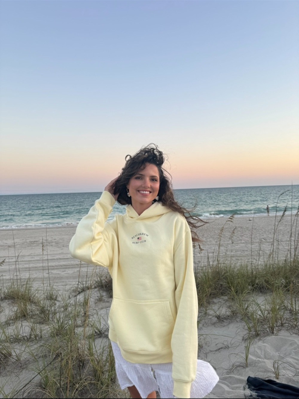 Relaxed Pale Yellow Pullover Hoodie with Subtle Chest Logo